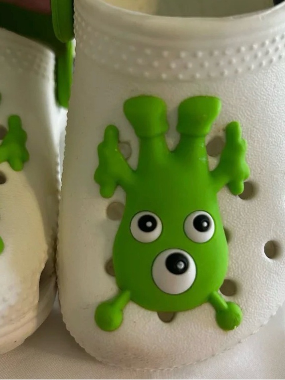CROCS Kids White Clogs with Bright Green Monster Charm